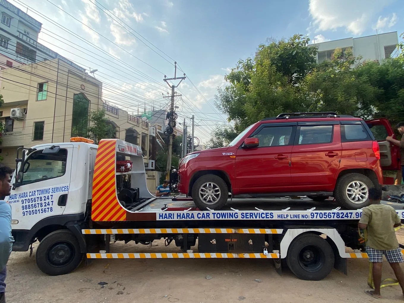 Car being towed in Narketpally